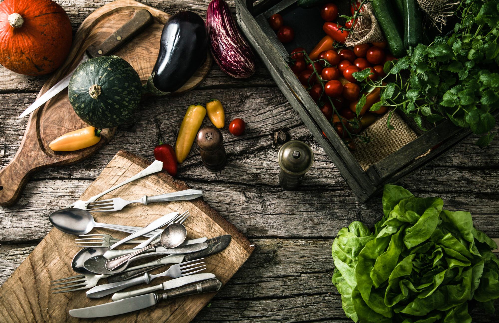Close-up of fresh ingredients and utensils on wooden table